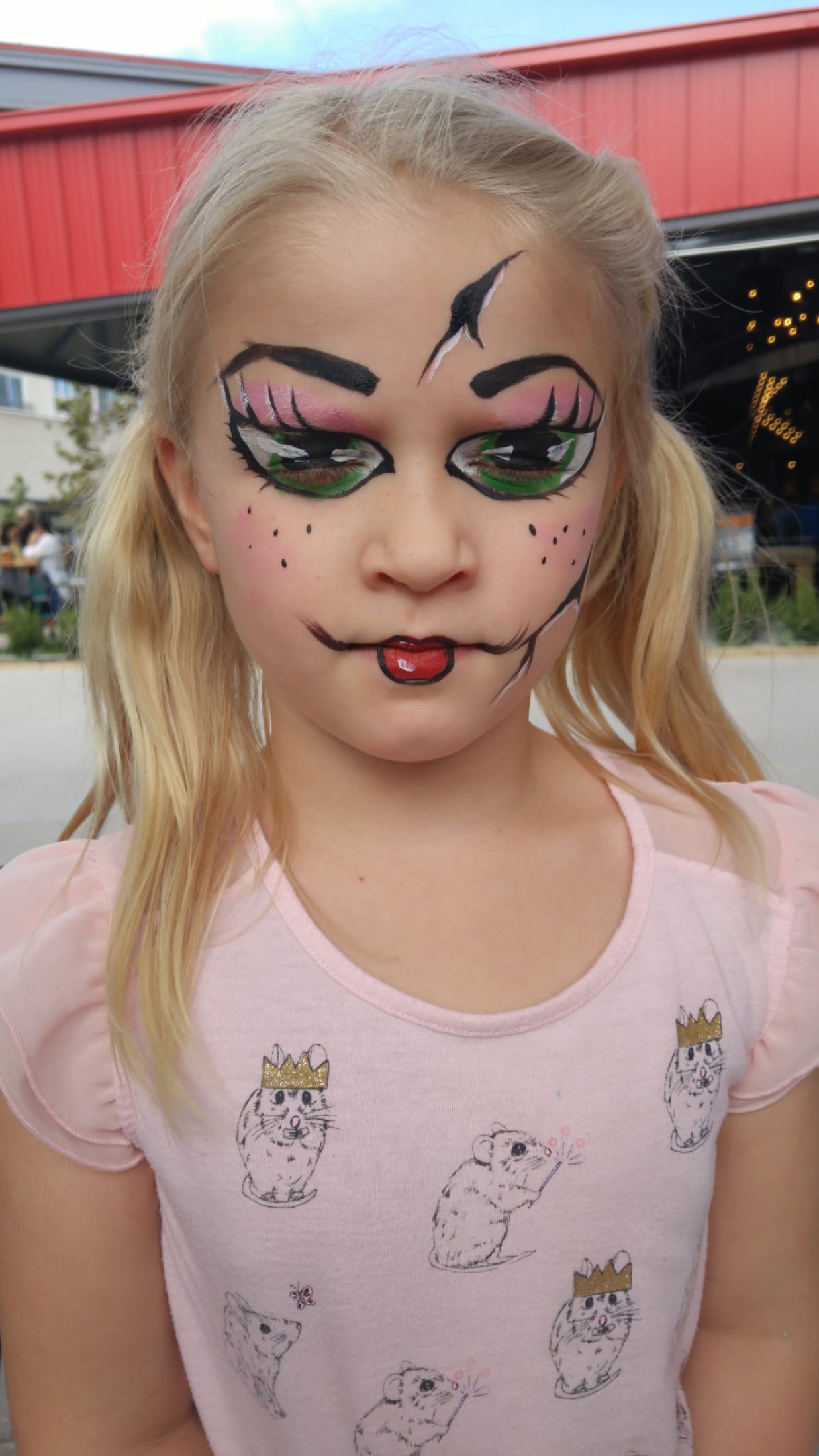 Child with colorful face paint