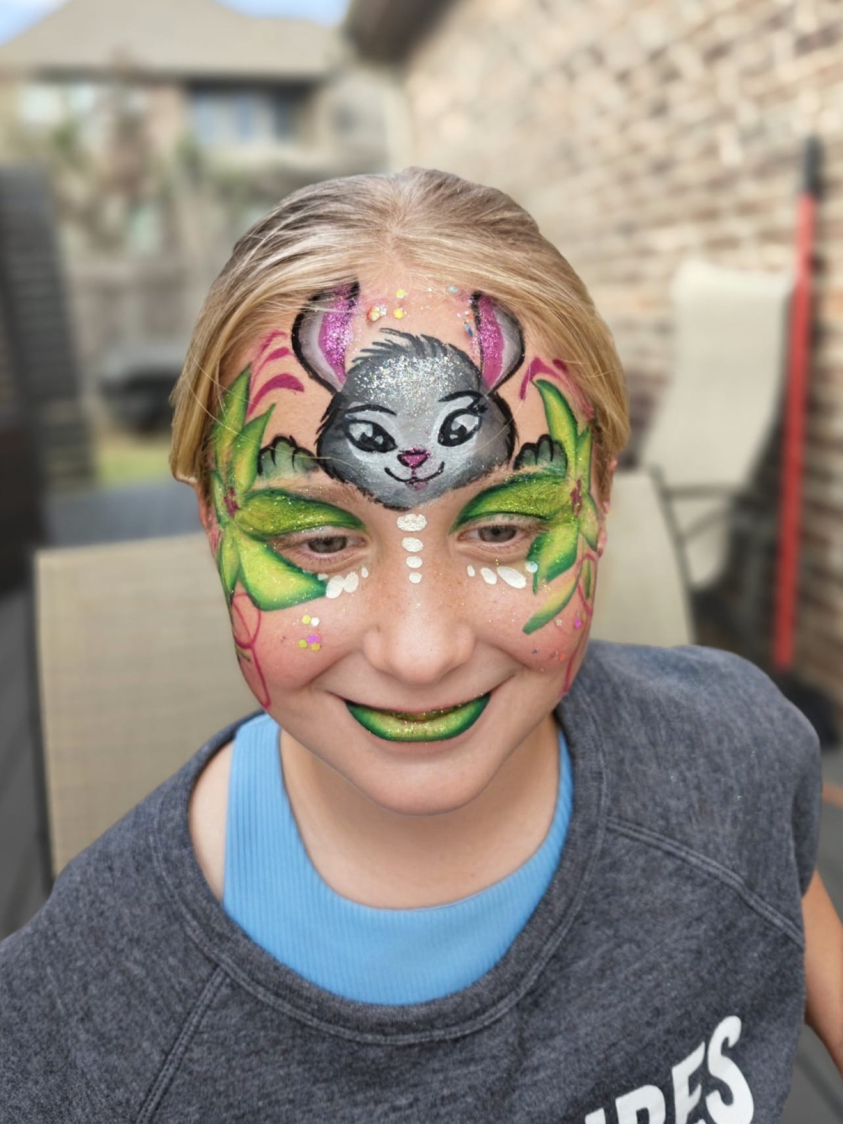 Child with colorful face paint